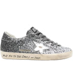 Golden Goose Super Star trainers with glitter upper and silver metallic leather star